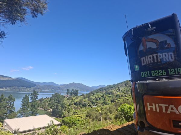 DirtPro Hitachi excavator on the new build site above Mahau Sound